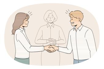 Two persons shaking hands