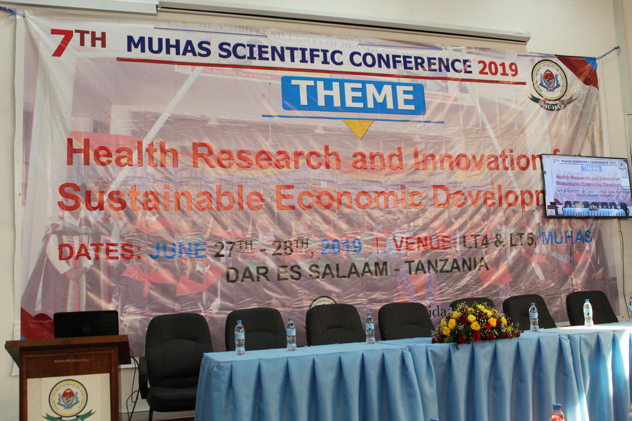 Conference banner and table with chairs