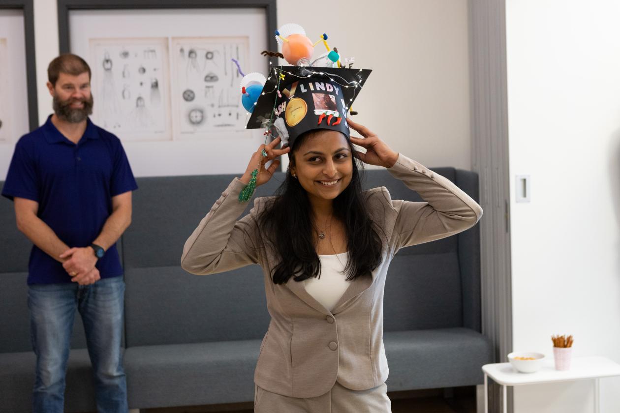 Aishwarya Ravi tries on her graduation hat