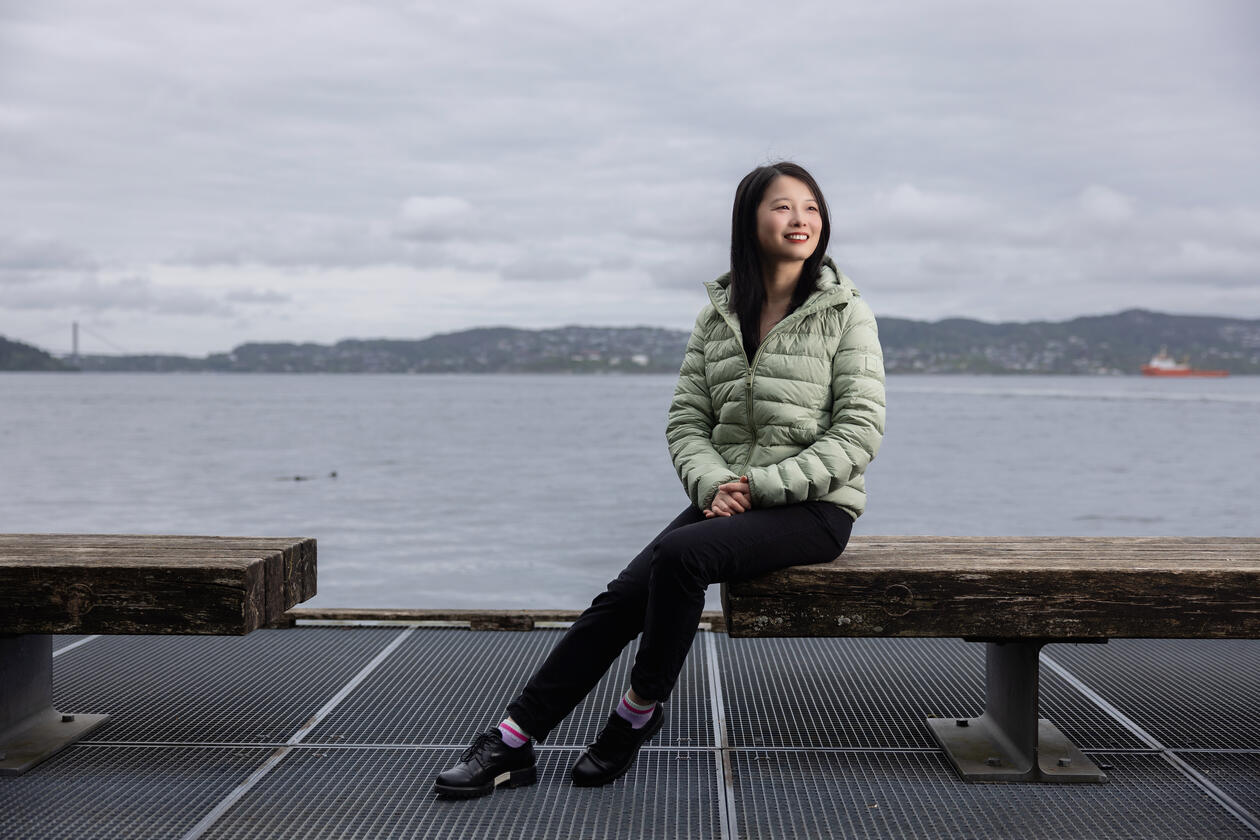 Yan Li by the shore in Bergen, known as "the capital of the fjords".
