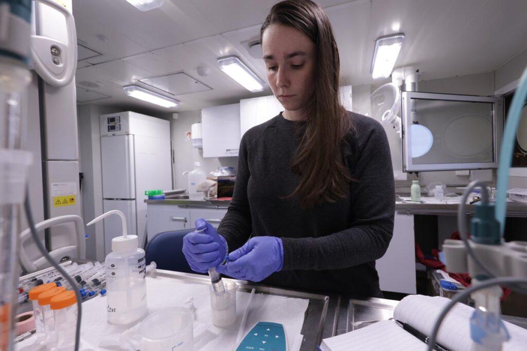 Scientist samples pore water in a lab