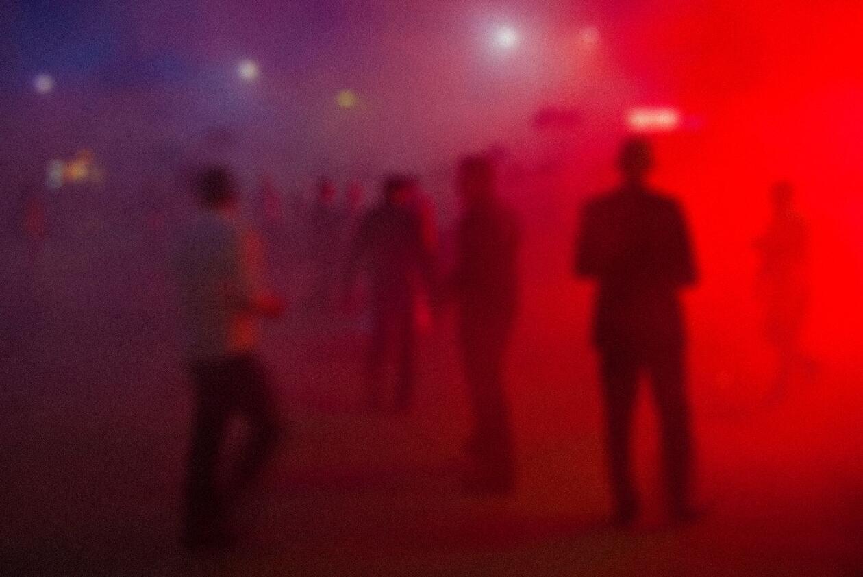 Humans in blurred, red fog. Illustration from Colorbox.com