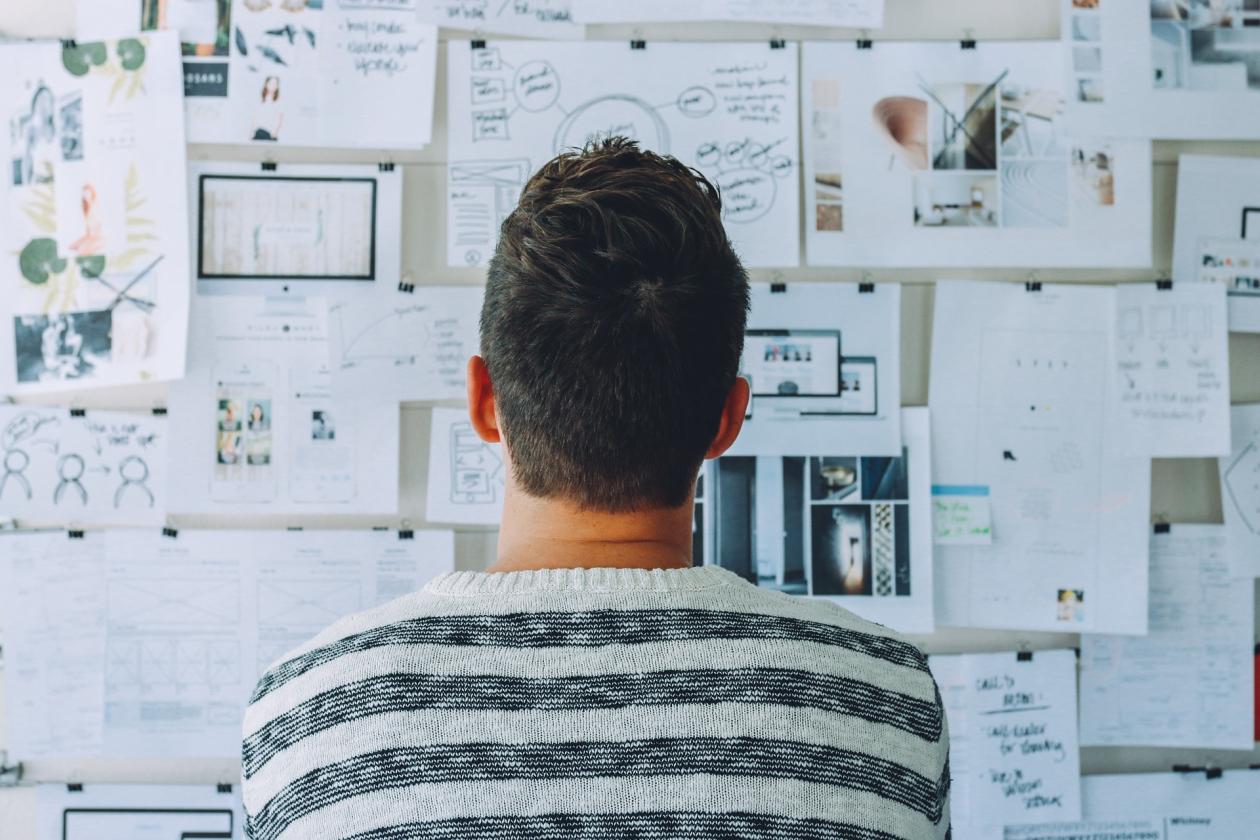 Person looking at a notice board