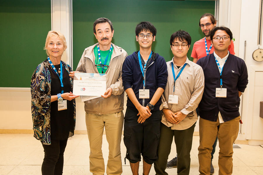 Frances Rosamond presenting award to the japanese team