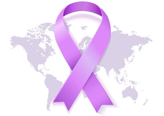 Cancer ribbon on a world map