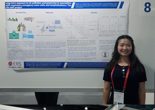 Two researchers stand in front of their respective poster presentations at the European Respiratory Society (ERS) congress 2024. 