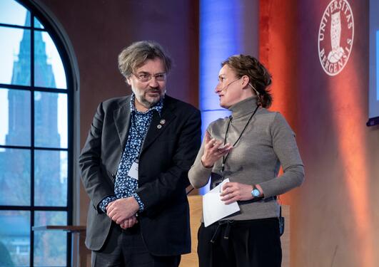 Professors and marine scientists Sigrid Eskeland Schütz and Edvard Hviding on stage at the inaugural Ocean Sustainability Bergen Conference in October 2019. 