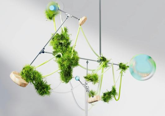 A mobile made of green plants and balls