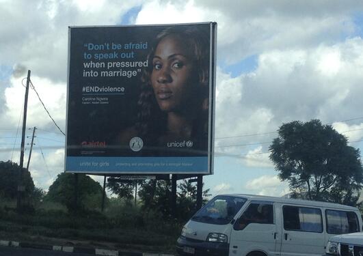 Picture of a Unicef poster with a picture of a woman and the text: Don't be afraid to speak out when pressuered into marriage". #ENDviolence