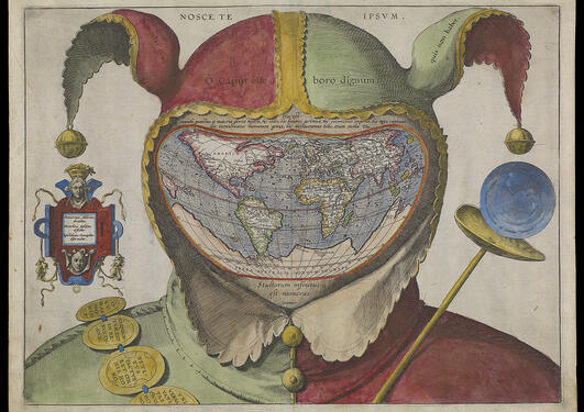 Picture of a map of the world in form of a head wearing a fool's cap.