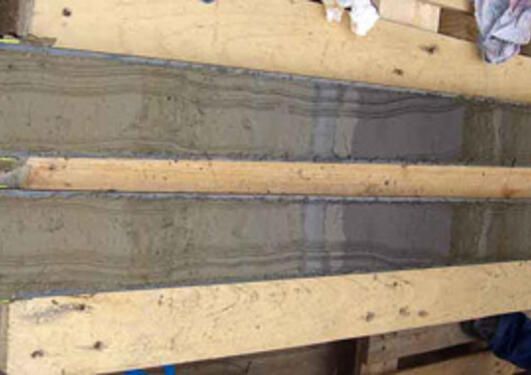 view of a gravity core split open - you can see the different layers